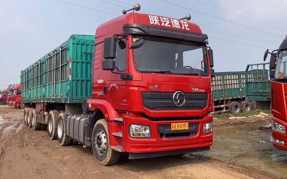 18年德龙m3000二手牵引车,11米高栏半挂车