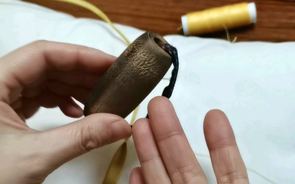 70后童年的记忆,手缝神器——奶奶的木顶针,被针鼻顶得凹痕深深又被