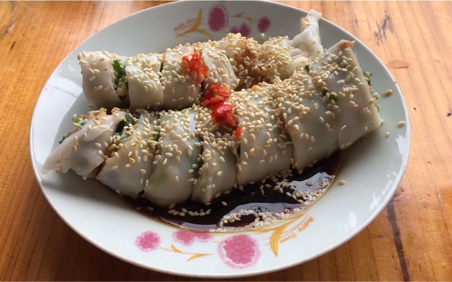 作为信宜人早餐怎少得了白粥捞粉这肠粉放这么多芝麻真香