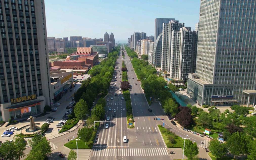 新乡市新中大道美丽街景,道路两侧高楼林立哔哩哔哩bilibili