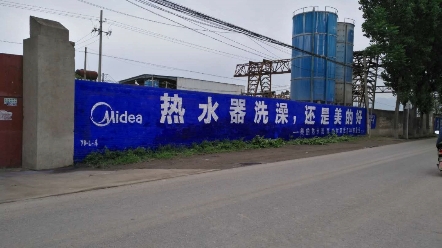 宜宾户外墙体广告发布墙体喷绘送温暖,暖人心