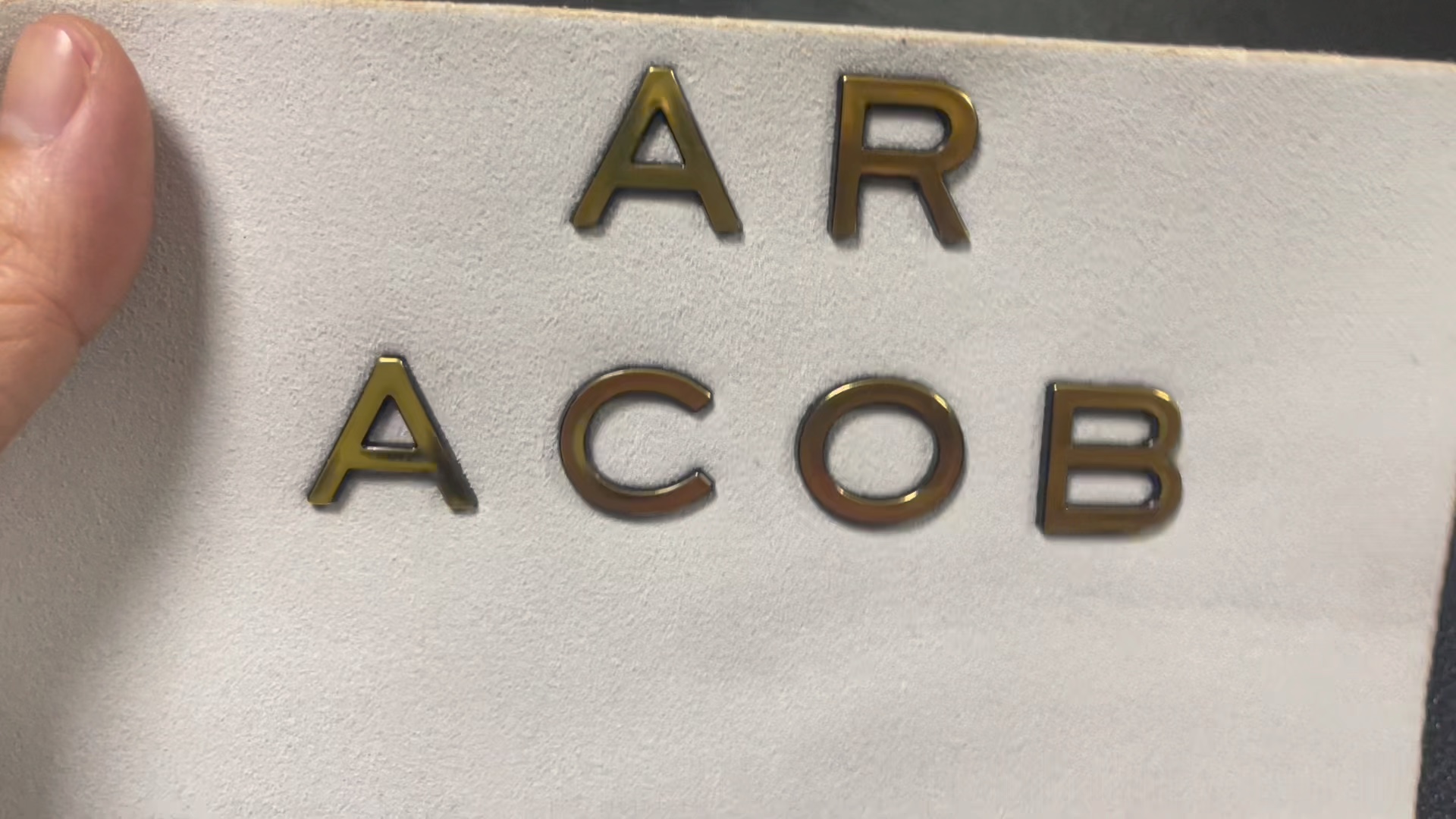 100mm黑金品牌手袋塑胶logo