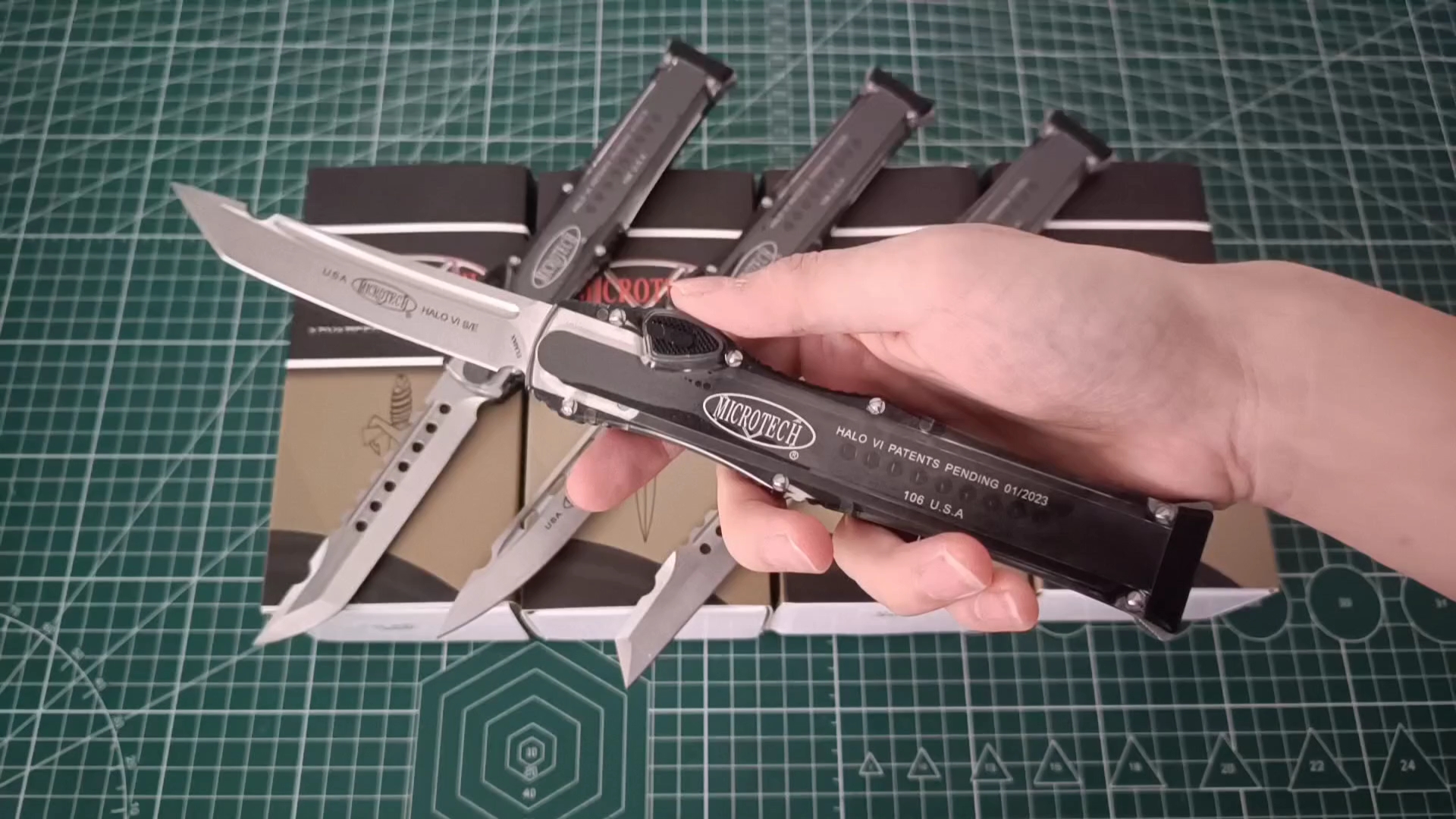 微技术光晕透明柄直跳弹簧刀