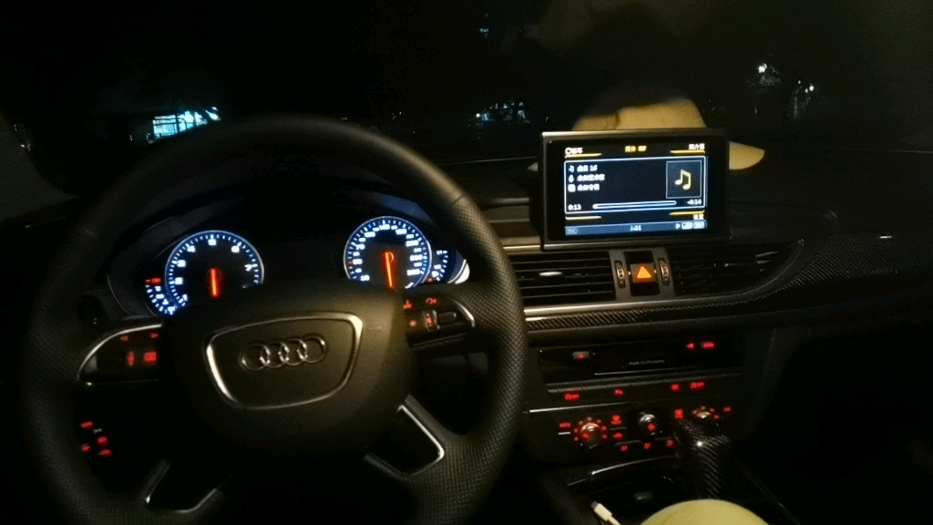 来听cd吧坐在c7代奥迪a6里听郑中基唱你的眼睛背叛了我的心