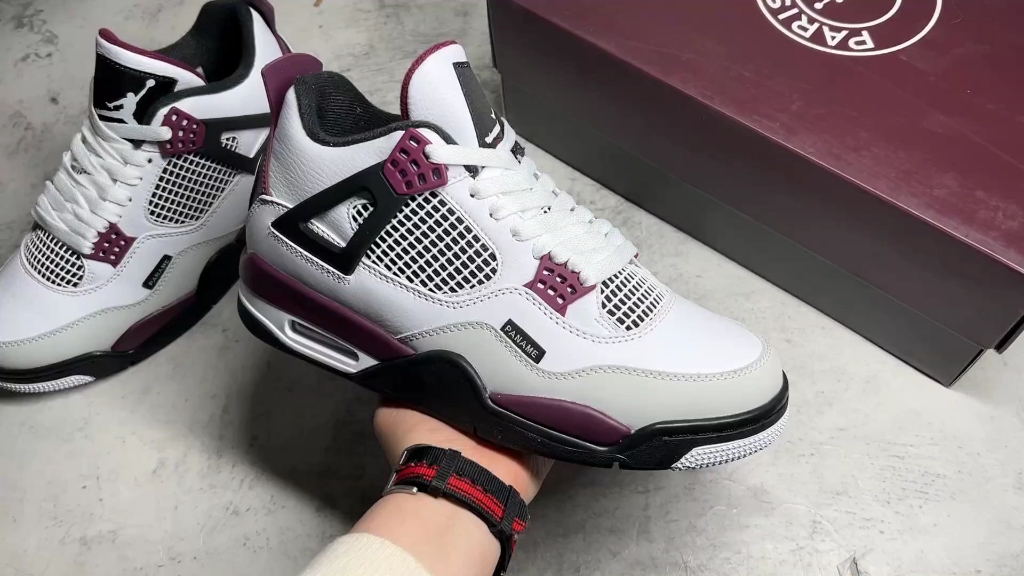 aj4白紫真假对比图片