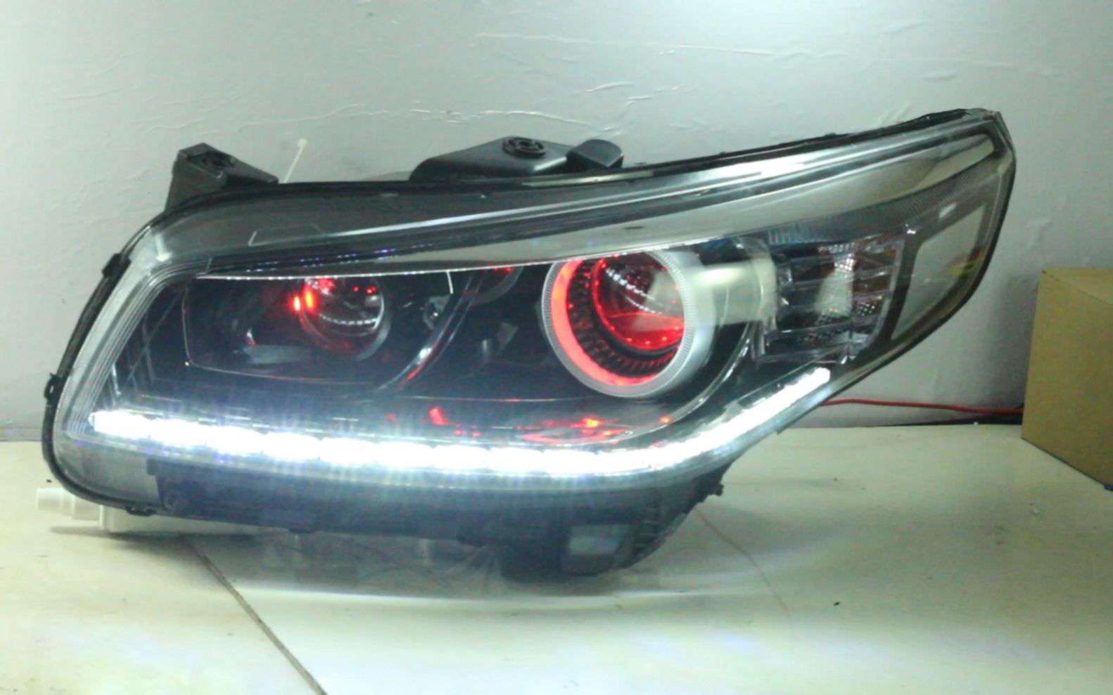 适用于起亚k4大灯总成改装led双光透镜恶魔眼日行灯流光