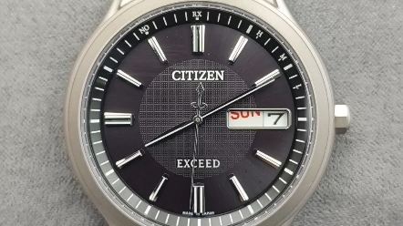 西铁城exceed钛合金双历光动能电波男表