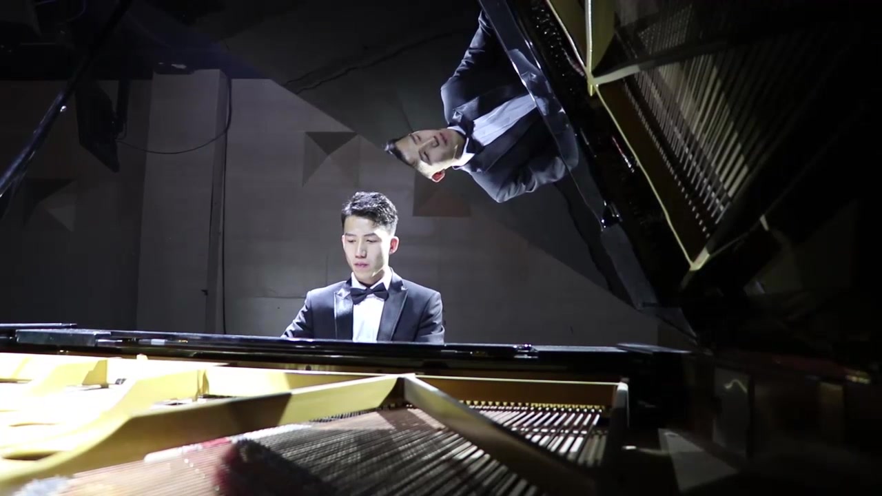 电影绿皮书中弹奏钢琴曲冬风练习曲