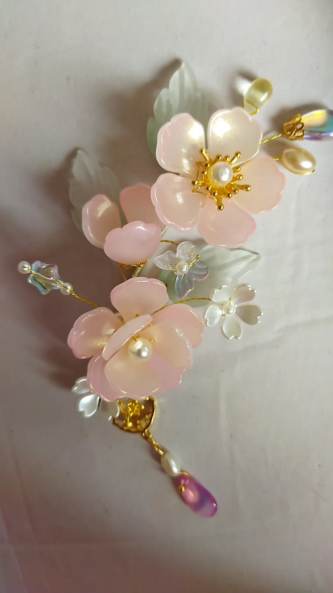 奶油粉海棠花软簪半天才鼓捣出一个成品磨磨唧唧的话说这个花瓣太闪了