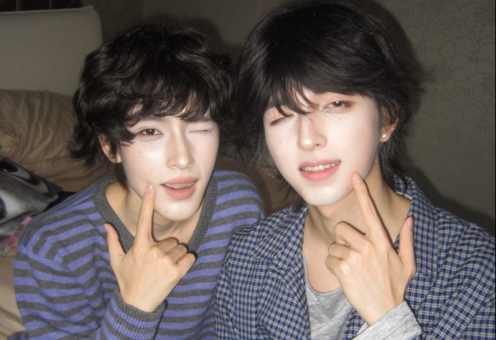 《少 化 成 男 妆》