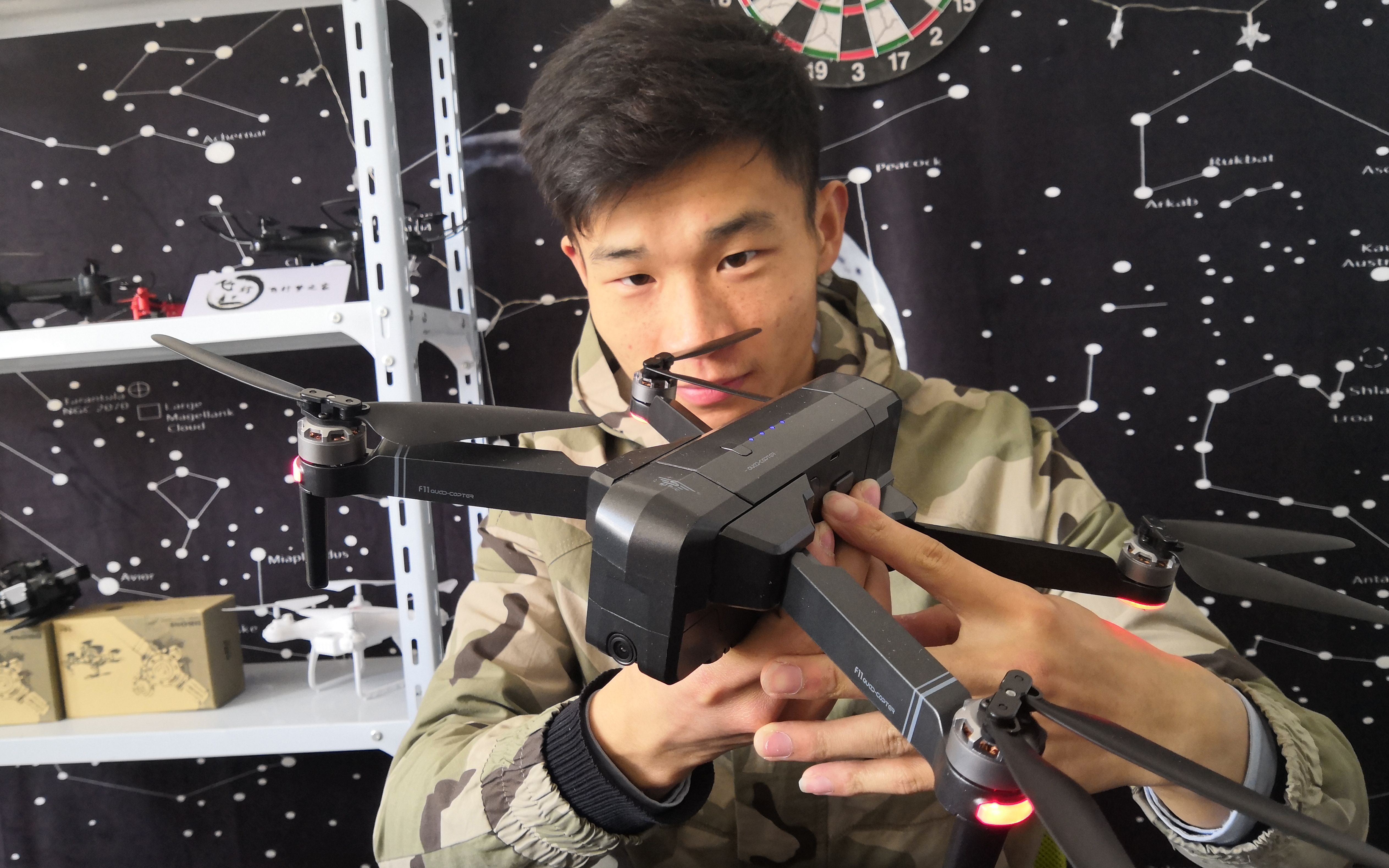 拆箱测评天鸽f11无人机,外观很酷,展开和大疆mavic差不多大_哔哩哔哩