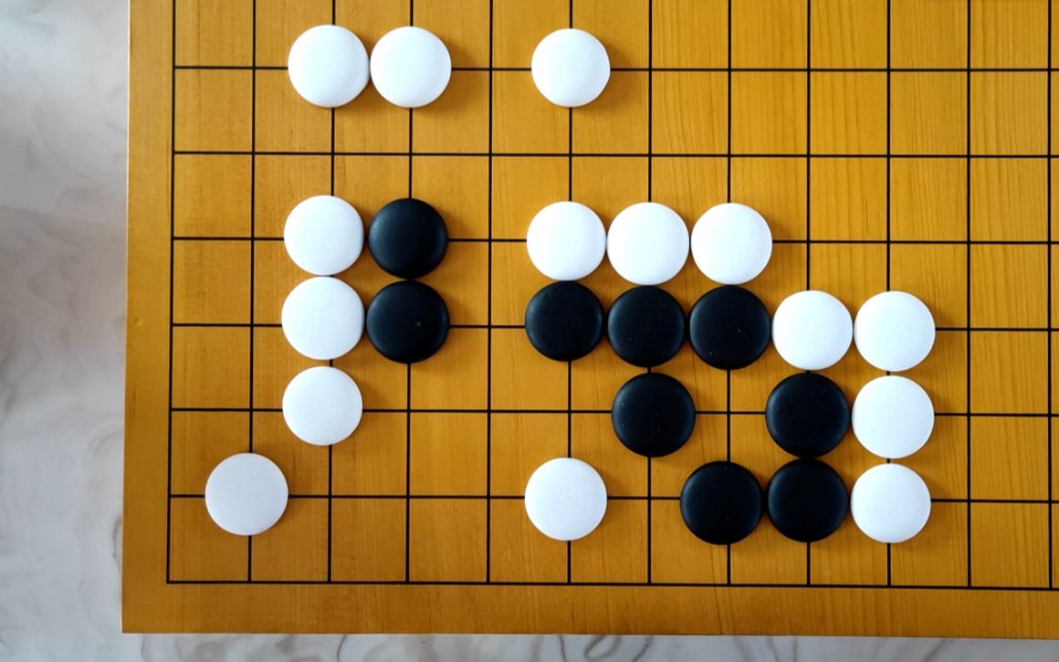 围棋死活题-黑先净活-利用巧妙的手段活棋