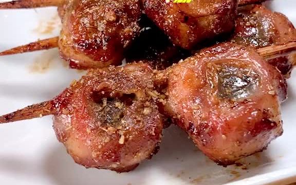 烤猪眼是百色烧烤的标志?