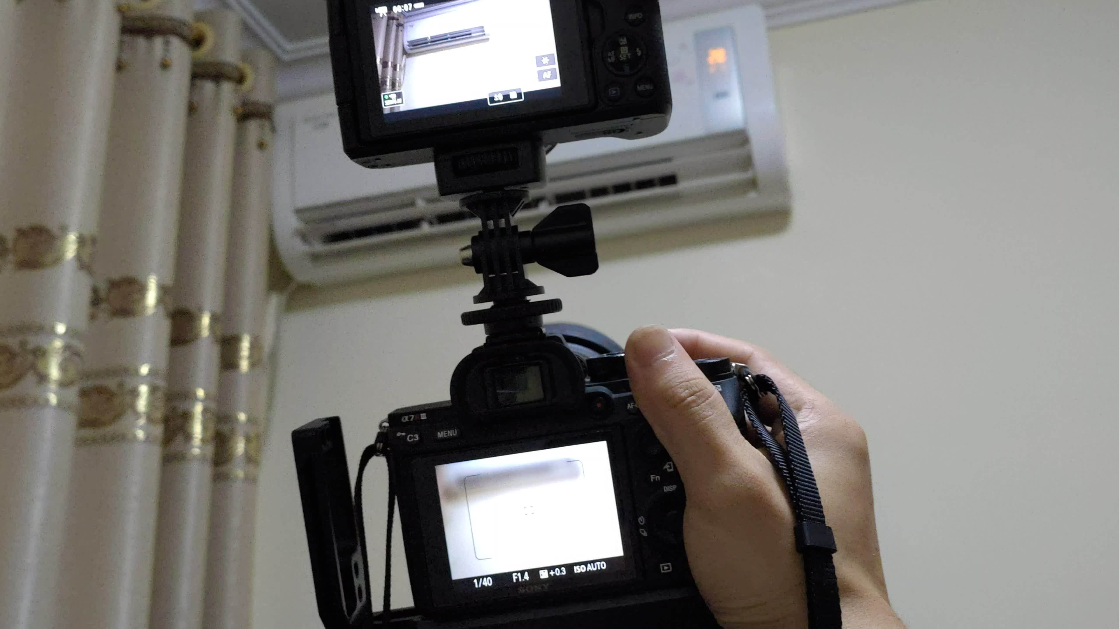 用两部相机同时录像和拍照的想法