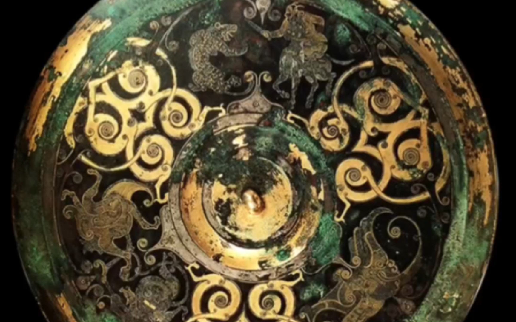 洛阳金村,错金狩猎纹铜镜