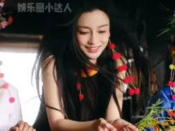 Video herunterladen: #Angelababy 最新杂志大片，布朗族簪花造型好美啊