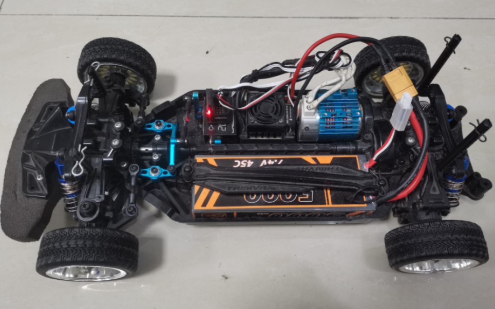 田宫tt02改装美嘉欣h16e液压避震,效果不错,比网上40来块钱的避震好