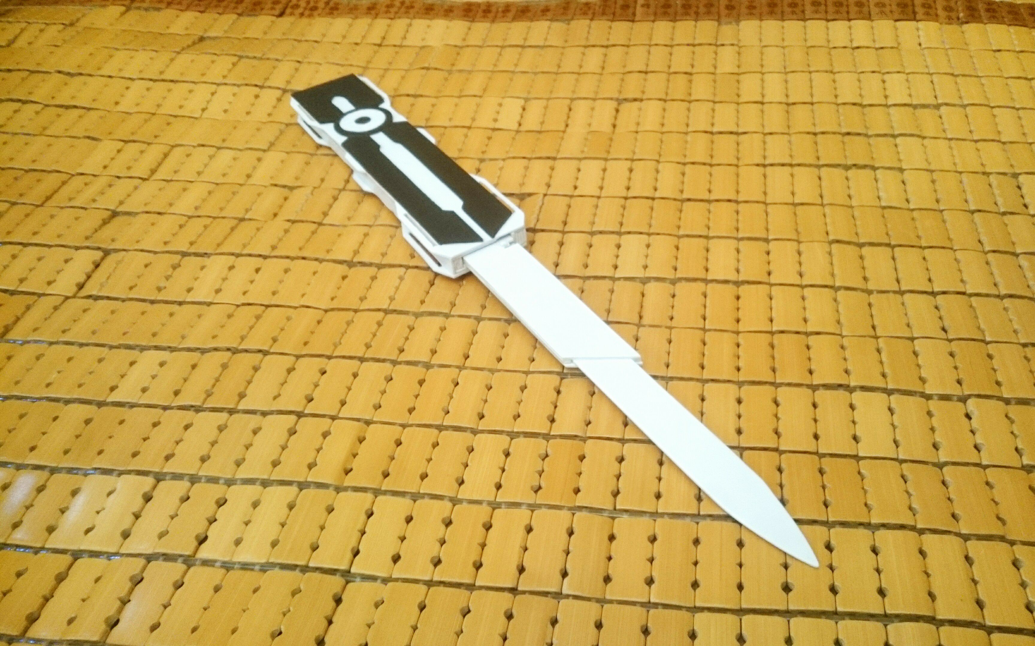 用a4纸做伸缩袖剑图片