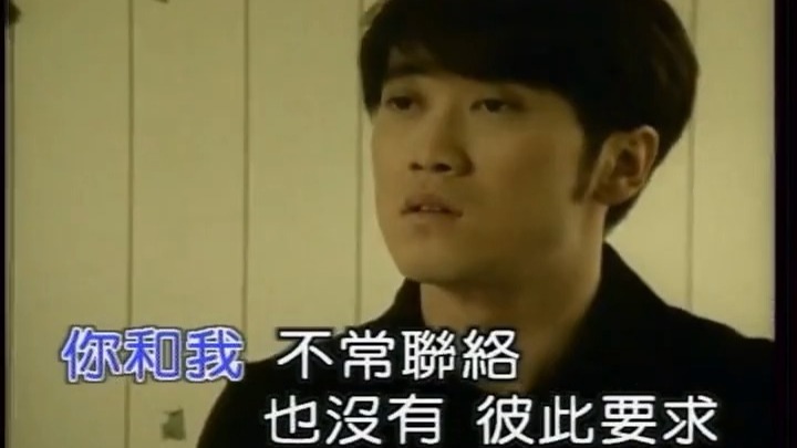 周传雄《暖风》