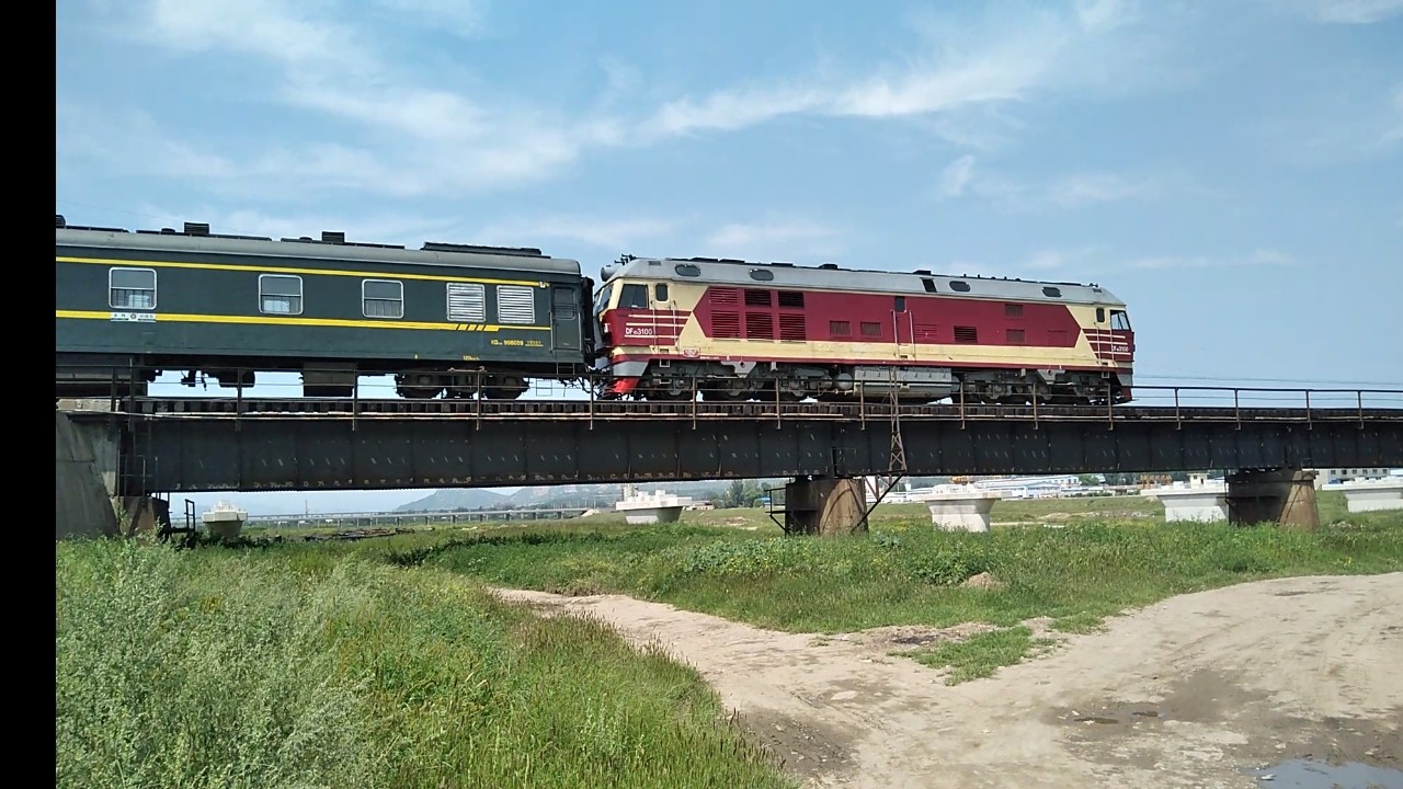 【中国铁路】沈局锦段df4dk3100牵引k7384次列车通过什家河铁路桥.