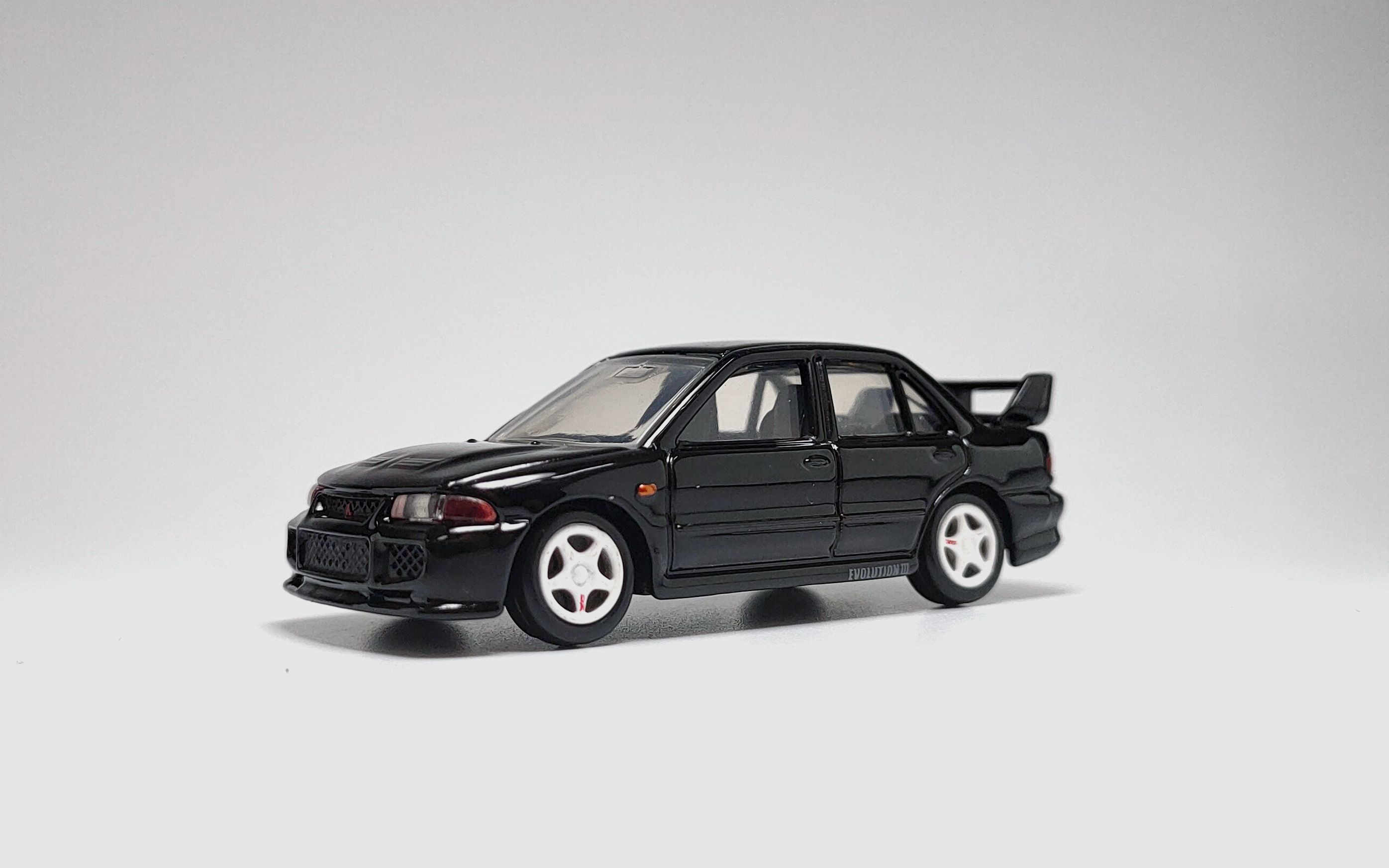 一分钟玩具开盒-多美卡黑盒三菱evo三代开盒把玩评测