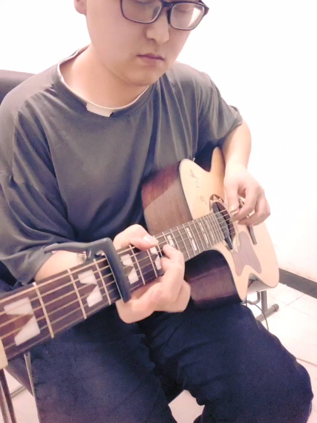 杨昊昆老师的作品武陵春春晚吉他