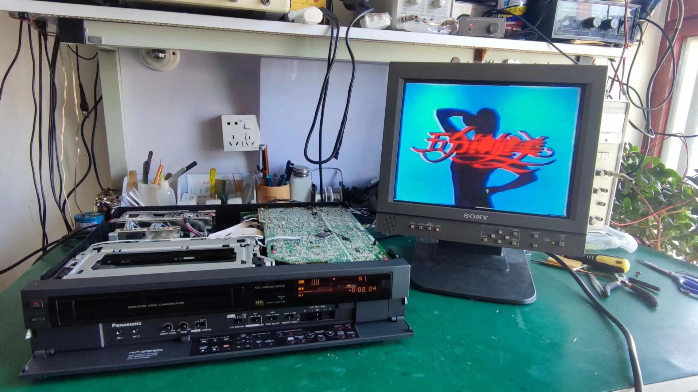 成都粉丝寄修的松下f55录像机,画面不定时出现白条,如何解决