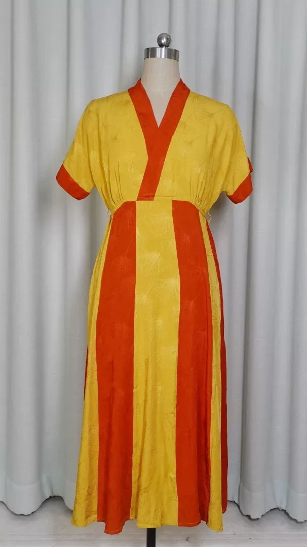 新配色|阿斯塔纳红黄间色裙,间色裙中网红款